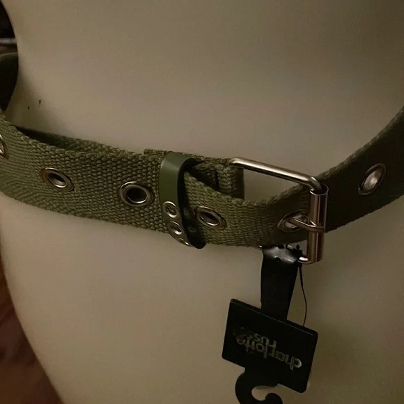 Women’s— green belt, with silver metal punch holes and silver buckle. - Picture 1 of 2